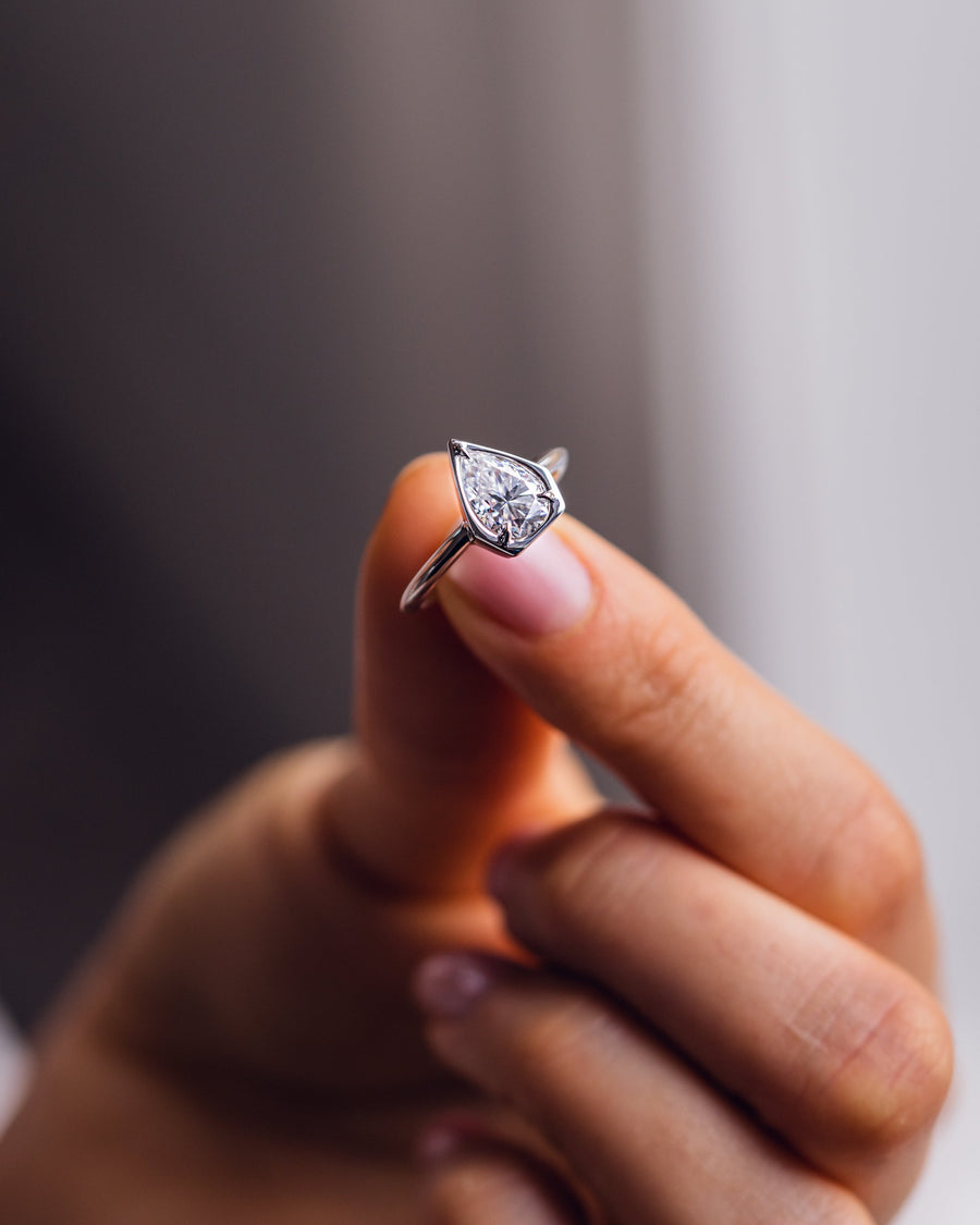 1.33 CT Pear Cut Bezel Solitaire Moissanite Engagement Ring - Barbara Maison 