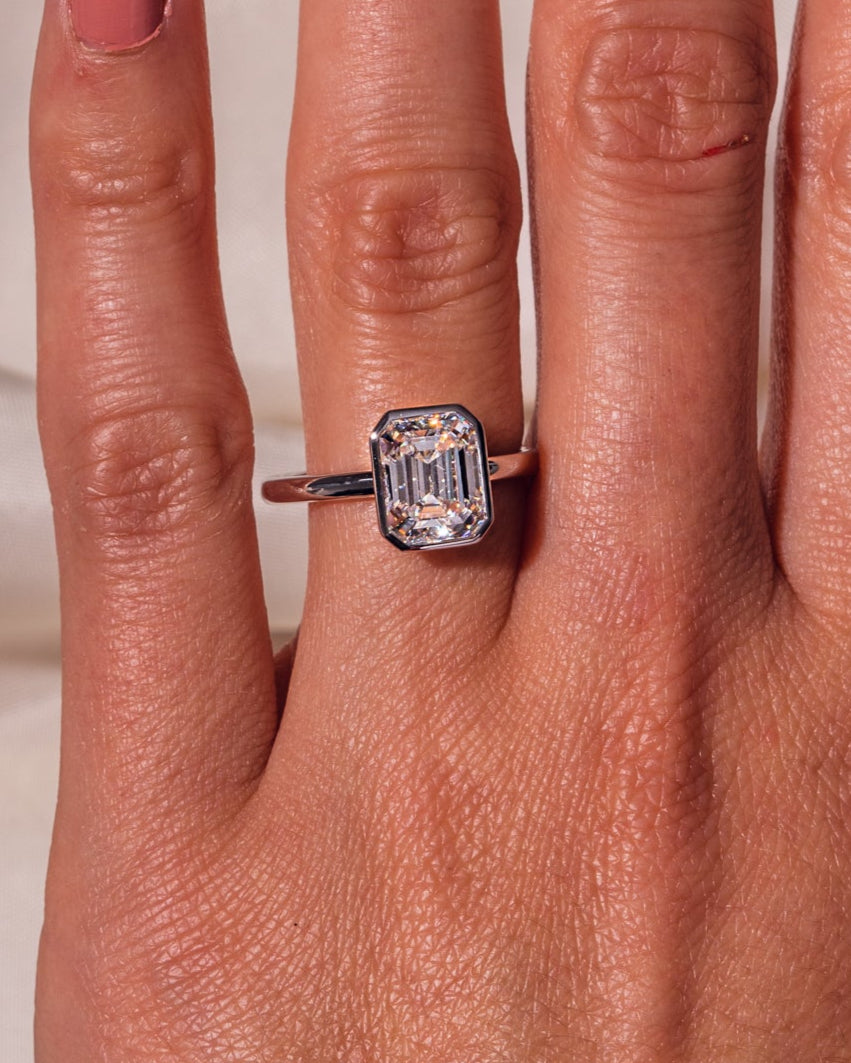 2.30 CT Emerald Cut Solitaire Bezel Setting Moissanite Engagement Ring - Barbara Maison 