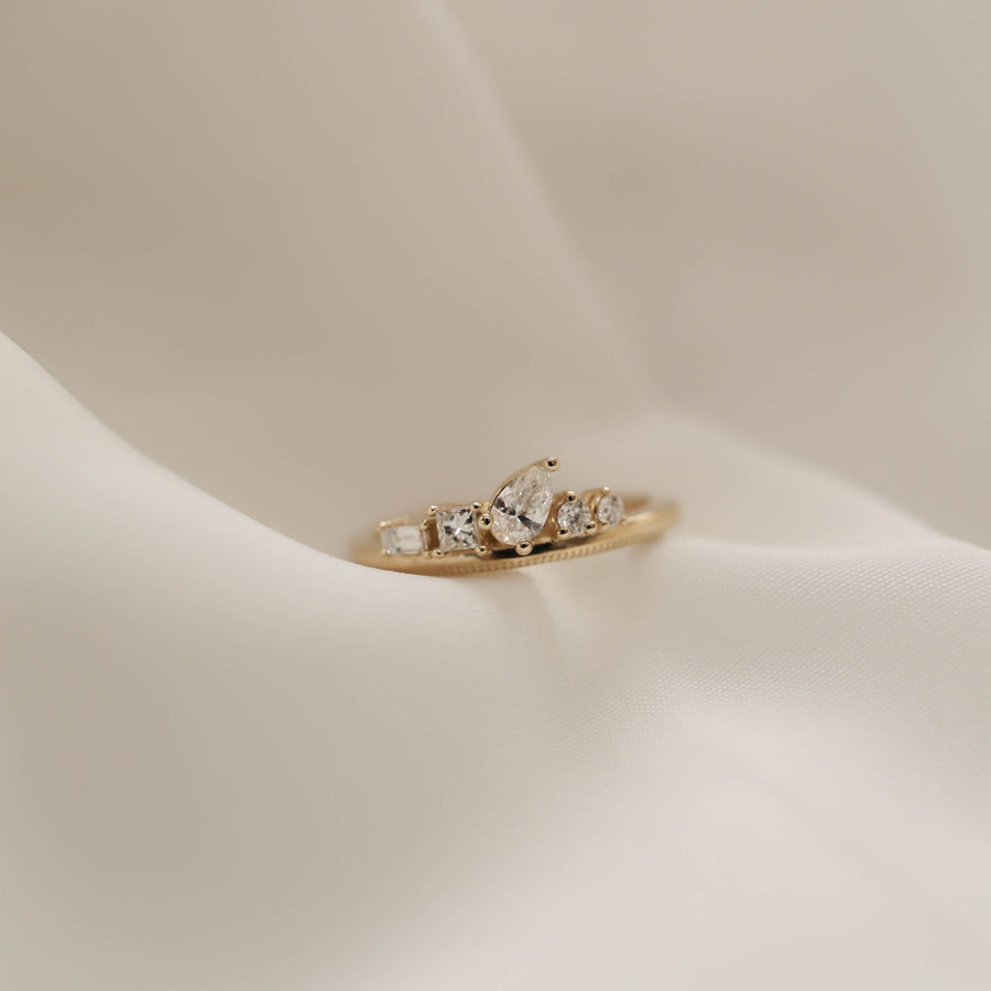 0.38 TCW Pear, Baguette, Square and Round Cluster Moissanite Wedding Band - Barbara Maison 