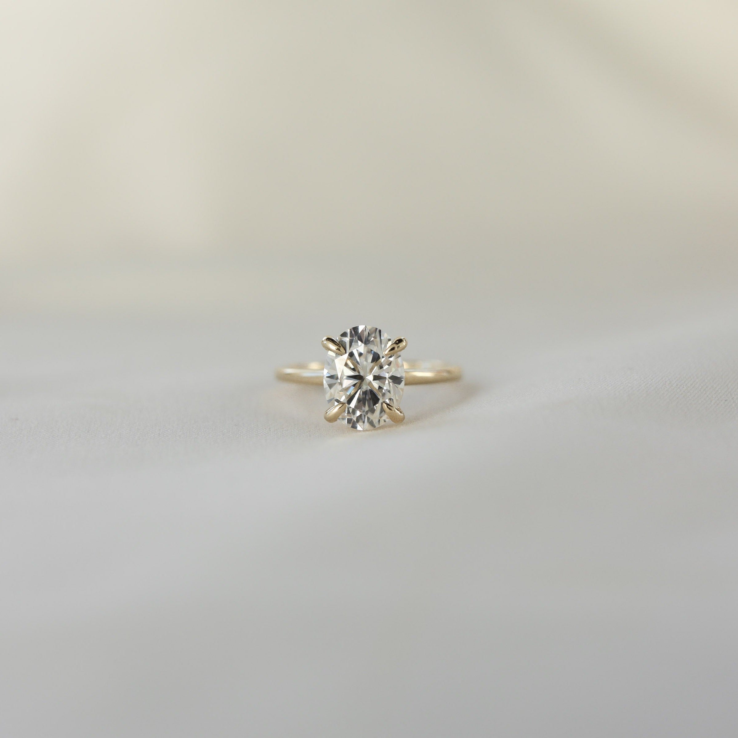 0.84 CT-1.91 CT Oval Cut Solitaire Moissanite Engagement Ring - Barbara Maison 