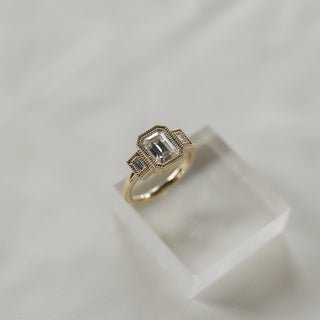 1.60 CT Emerald Cut Three Stone Moissanite Engagement Ring - Barbara Maison 