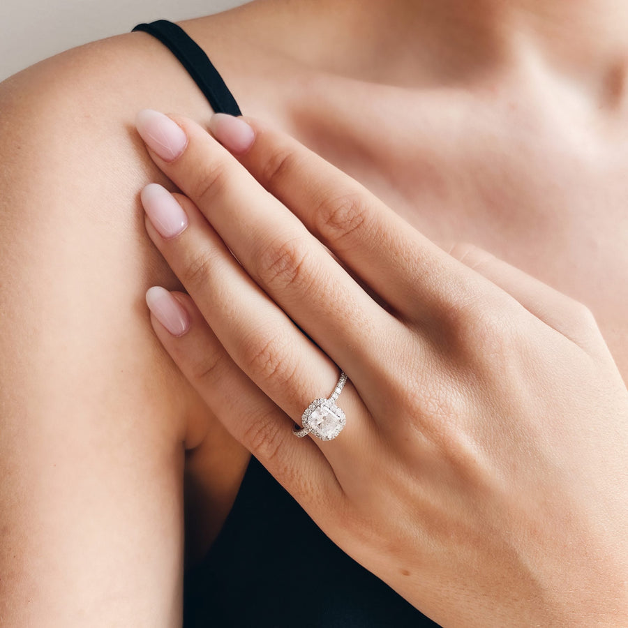 Radiant cut lab grown diamond engagement ring with halo and pavé setting, crafted in polished gold band