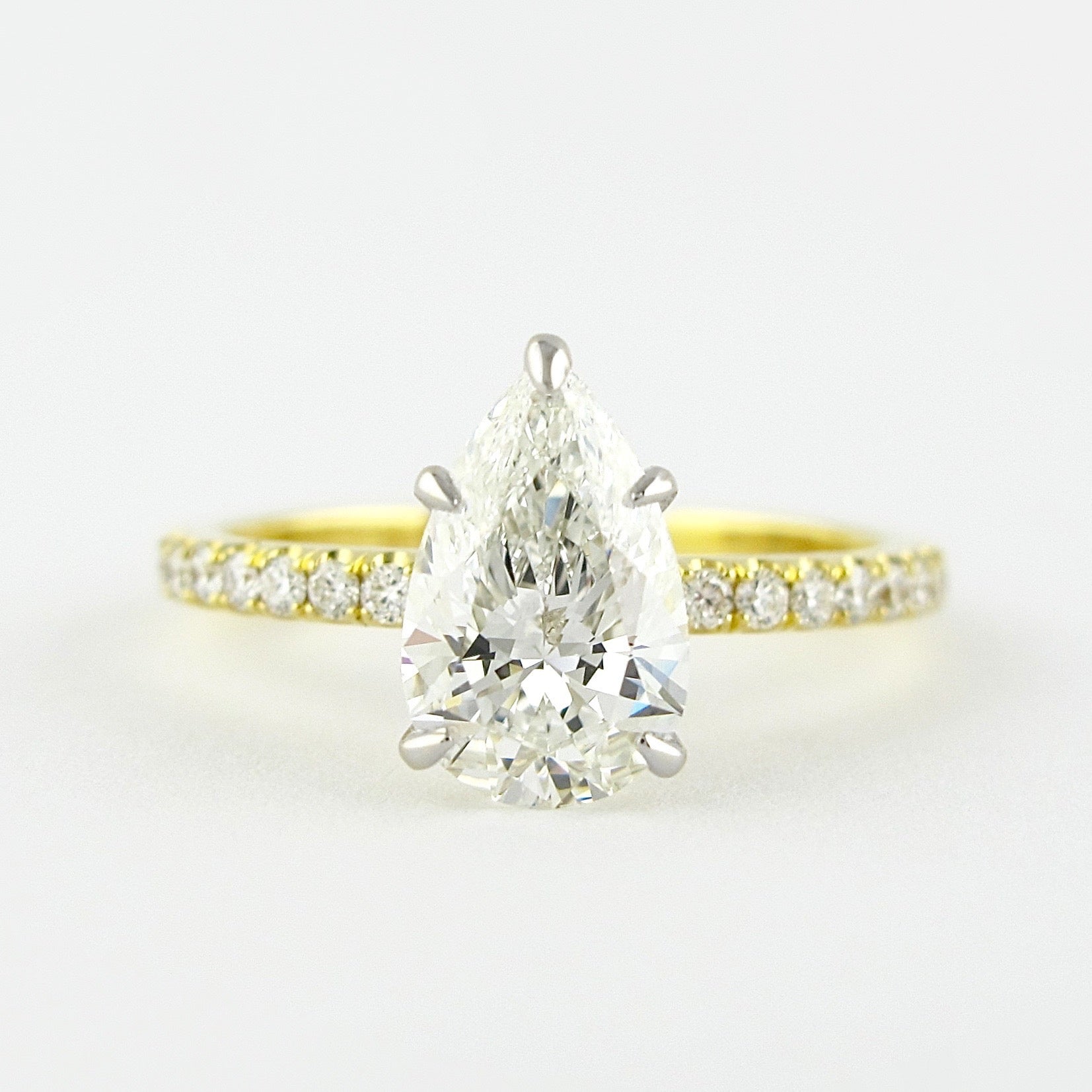0.94 CT Pear Solitaire & Pave Setting Moissanite Engagement Ring - Barbara Maison 