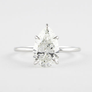 1.5 CT Pear Cut Solitaire Style Moissanite Engagement Ring - Barbara Maison 