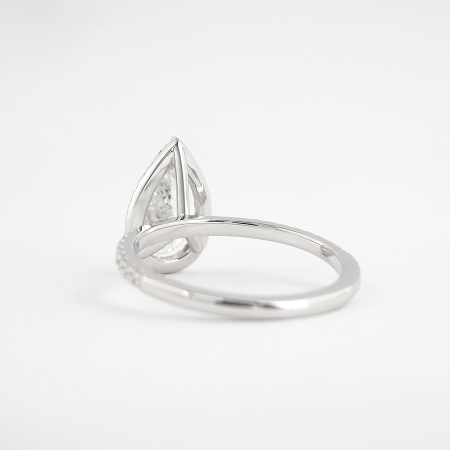 1.5 CT Pear Cut Halo Style Moissanite Engagement Ring - Barbara Maison 