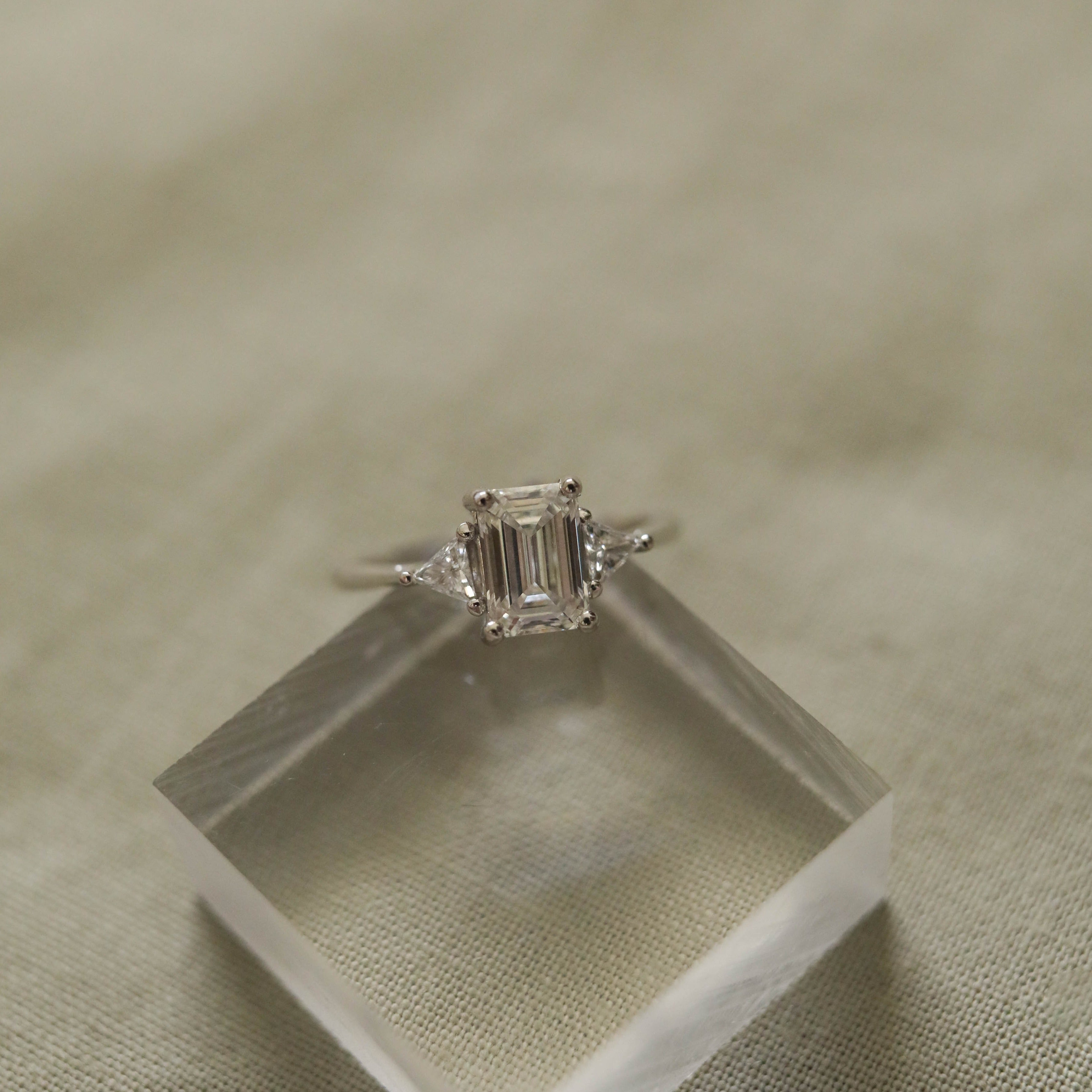 1.04 CT Emerald Cut Three Stone Moissanite Engagement Ring - Barbara Maison 