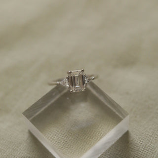 1.04 CT Emerald Cut Three Stone Moissanite Engagement Ring - Barbara Maison 