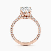 Pear cut lab grown diamond engagement ring with hidden halo and pavé setting on polished gold band