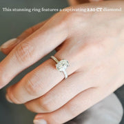 Oval cut lab grown diamond halo pavé engagement ring with side stones, set in prong design on polished gold band