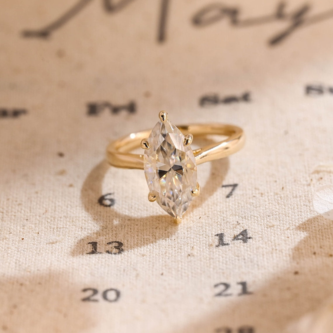 Marquise cut lab grown diamond solitaire engagement ring, 1.0 to 3.0 carats, set in classic prong design on polished gold band