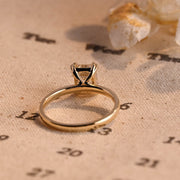 Emerald cut lab grown diamond solitaire engagement ring, 1.0 to 3.0 carats, set in classic prong setting on polished gold band