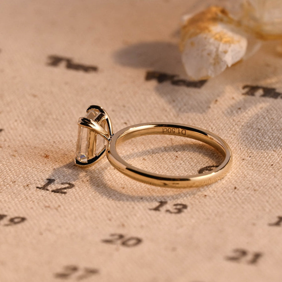 Emerald cut lab grown diamond solitaire engagement ring, 1.0 to 3.0 carats, set in classic prong setting on polished gold band