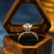 Round cut lab grown diamond unique engagement ring in a contemporary setting with elegant design on polished gold band