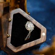 Round cut lab grown diamond unique engagement ring in a contemporary setting with elegant design on polished gold band