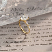 Oval cut F/VS1 lab grown diamond pavé engagement ring, 1.0 to 3.0 carats, with side stones set in polished gold band