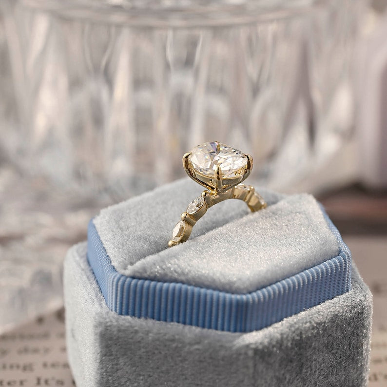 Oval cut F/VS1 lab grown diamond pavé engagement ring, 1.0 to 3.0 carats, with side stones set in polished gold band