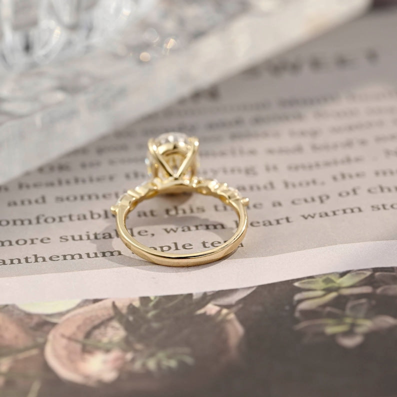 Oval cut F/VS1 lab grown diamond pavé engagement ring, 1.0 to 3.0 carats, with side stones set in polished gold band