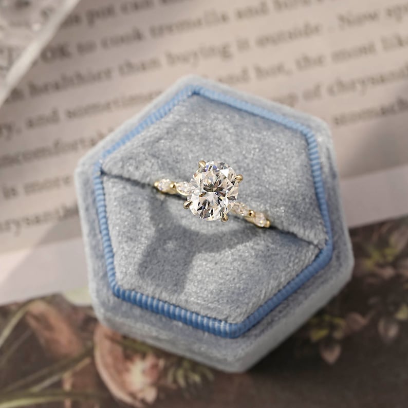 Oval cut F/VS1 lab grown diamond pavé engagement ring, 1.0 to 3.0 carats, with side stones set in polished gold band