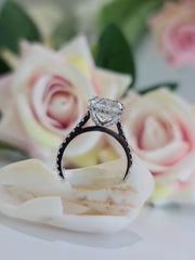 Oval cut lab grown diamond hidden halo engagement ring with delicate pavé accents set in polished gold band