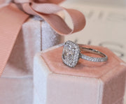 Cushion cut lab grown diamond double halo engagement ring with pavé accents set in polished gold band